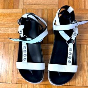White synthetic leather sandals